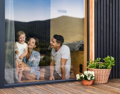 Family looking out of a window